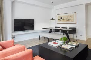 TV a/nebo společenská místnost v ubytování Koxtape Apartment by FeelFree Rentals