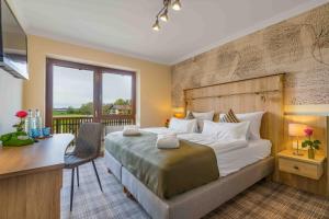 Postel nebo postele na pokoji v ubytování Chalet An der Brunnader-Ihr perfekter Rückzugsort in der Bayerischen Toskana-Überwiegend mit Klima-3Geh-Min zur Therme + 37 fotografií