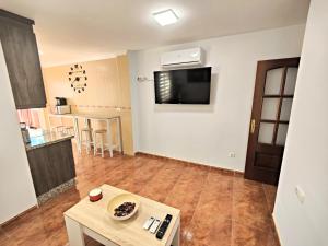 Μια τηλεόραση ή/και κέντρο ψυχαγωγίας στο Ático Centro Antequera +28 φωτογραφίες