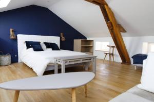 Llit o llits en una habitació de Maison Baptistine