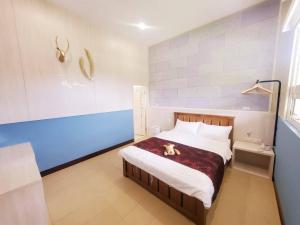 Moon Shine B&B tesisinde bir odada yatak veya yataklar