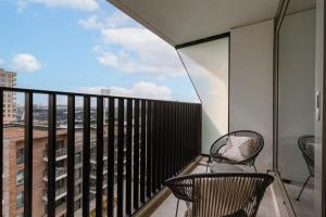 Balkón nebo terasa v ubytování Huswell - Seaside Apartment with Shared Pool