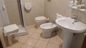 Koupelna v ubytování Hotel 4 Mori