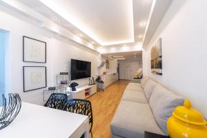 Televízia a/alebo spoločenská miestnosť v ubytovaní D9 center of Glyfada