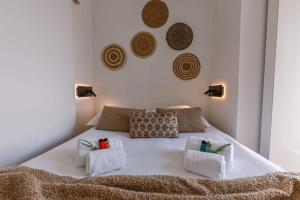 Huswell - Stunning Seafront Apartment客房内的一张或多张床位