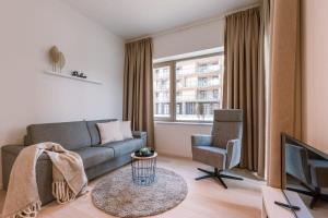 Posezení v ubytování Huswell - Modern apartment in a new residence near the sea