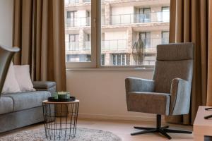 Posezení v ubytování Huswell - Modern apartment in a new residence near the sea