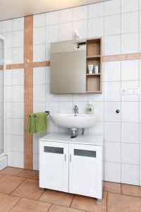 Koupelna v ubytování Ferienwohnung Morgenrot im Haus Auszeit Crusoh