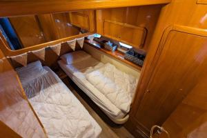 a small room with two beds in it at Le Sky Sailor, idéal Lions in Cannes