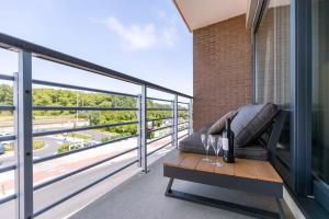 Balkón nebo terasa v ubytování Huswell - Bright apartment with parking near the beach