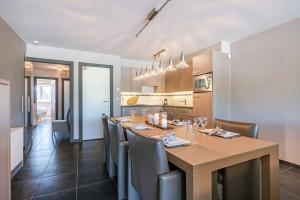 Kuchyň nebo kuchyňský kout v ubytování Huswell - Bright apartment with parking near the beach