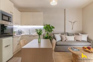 A kitchen or kitchenette at Romantic Luxury Hideaway Near Acropolis with Jacuzzi