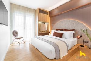 Ένα ή περισσότερα κρεβάτια σε δωμάτιο στο Urban Views, Modern Apartment In The Heart of Athens