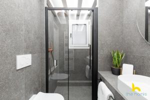 Ένα μπάνιο στο Urban Views, Modern Apartment In The Heart of Athens