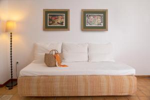 Кровать или кровати в номере Archipelago Sifnos - Seaside Accommodation