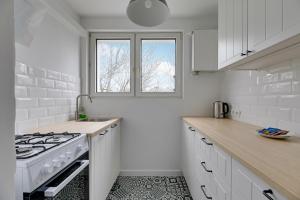 Η κουζίνα ή μικρή κουζίνα στο Comfort Apartments Stolarska