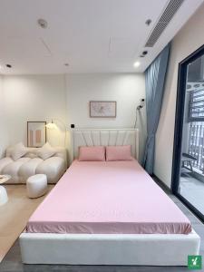 Cama o camas de una habitación en Bunny Bliss-Service Apartment