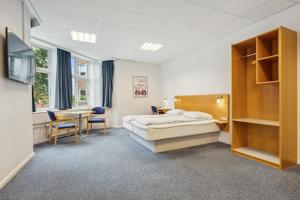 Postel nebo postele na pokoji v ubytování BB-Hotel Vejle Park