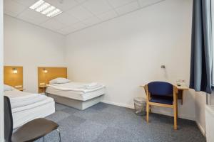 Postel nebo postele na pokoji v ubytování BB-Hotel Vejle Park