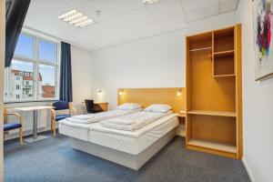 Postel nebo postele na pokoji v ubytování BB-Hotel Vejle Park