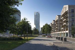a street in a city with tall buildings at Huswell - Beautiful apartment in the heart of Antwerp in Antwerp