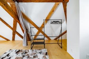 Letto o letti in una camera di Kníže Ferdinand Apartments