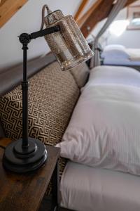 Letto o letti in una camera di Kníže Ferdinand Apartments