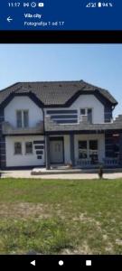a picture of a large house with at Vila City in Bijeljina