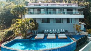 an aerial view of a house with a swimming pool at Villa Karma Pokhara in Pokhara