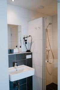 Phòng tắm tại Hotel Kodde