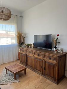 TV a/nebo společenská místnost v ubytování Apartamento renovado Miami Platja