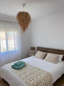 Postel nebo postele na pokoji v ubytování Apartamento renovado Miami Platja + 27 fotografií
