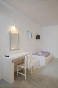 Postel nebo postele na pokoji v ubytování Sunrise Hotel