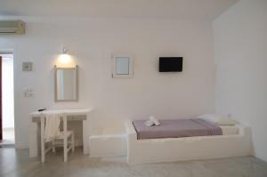 Postel nebo postele na pokoji v ubytování Sunrise Hotel