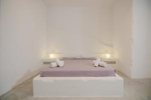 Postel nebo postele na pokoji v ubytování Sunrise Hotel