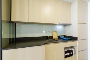 Kuchyň nebo kuchyňský kout v ubytování loft高级公寓 近jodd 夜市 500mbps Wi-Fi 双床