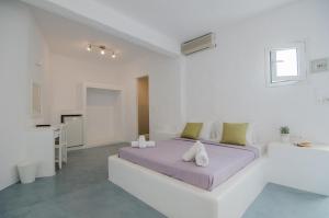 Postel nebo postele na pokoji v ubytování Sunrise Hotel