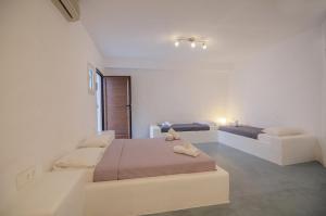 Postel nebo postele na pokoji v ubytování Sunrise Hotel