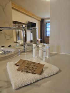 a white towel sitting on a kitchen counter at Albergue Real Fabrica de Ezcaray in Ezcaray