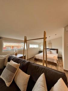 Ένα ή περισσότερα κρεβάτια σε δωμάτιο στο Maya Suites N.Moudania +16 φωτογραφίες