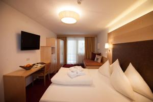 Posteľ alebo postele v izbe v ubytovaní Hotel Albona