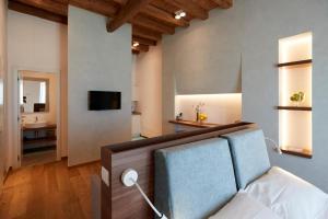 Televízia a/alebo spoločenská miestnosť v ubytovaní B&B Suite Home Trani