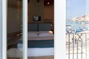 Posteľ alebo postele v izbe v ubytovaní B&B Suite Home Trani