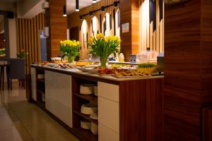 a buffet line with many different types of food at Resort Holiday Home Centrum Opieki i Rehabilitacji in Jarosławiec
