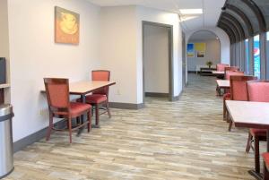 a dining room with tables and chairs at Days Inn by Wyndham Harriman in Harriman