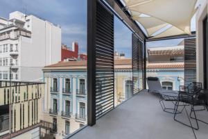 a balcony with a view of a building at RS Boutique Apartments in Alicante