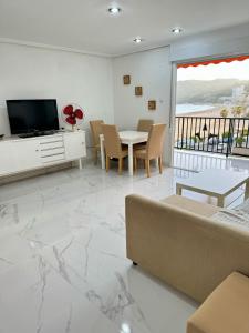 TV a/nebo společenská místnost v ubytování Oropesa del Mar - La Playa de la Concha