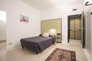 Postel nebo postele na pokoji v ubytování Hotel Buonconsiglio