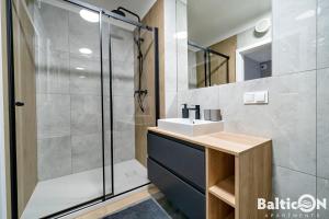 Kúpeľňa v ubytovaní Apartamenty BalticON Kasprowicza parking inclusive