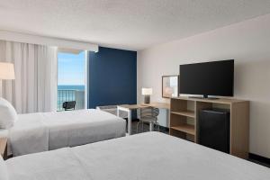 Spark by Hilton Ormond Beach Oceanfront客房内的一张或多张床位